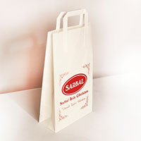 Paper bags made from kraft paper with flat handles
