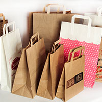 Paper bags made from kraft paper with flat handles
